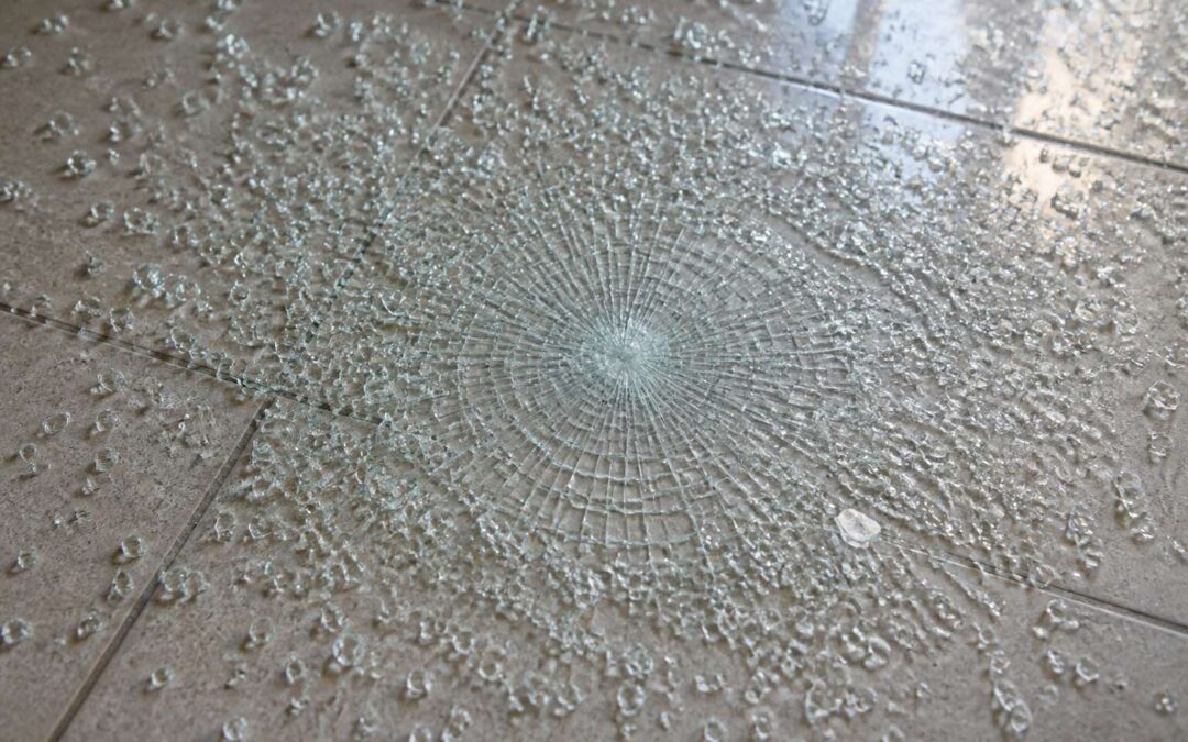 why tempered glass shatters on tiles; the edge impact is the culprit.