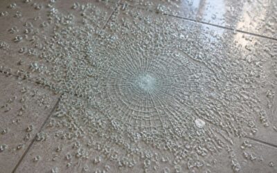 why tempered glass shatters on tiles; the edge impact is the culprit.